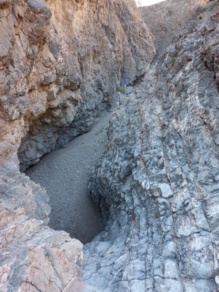 Another angle showing the sloped dry fall and narrows down canyon:
