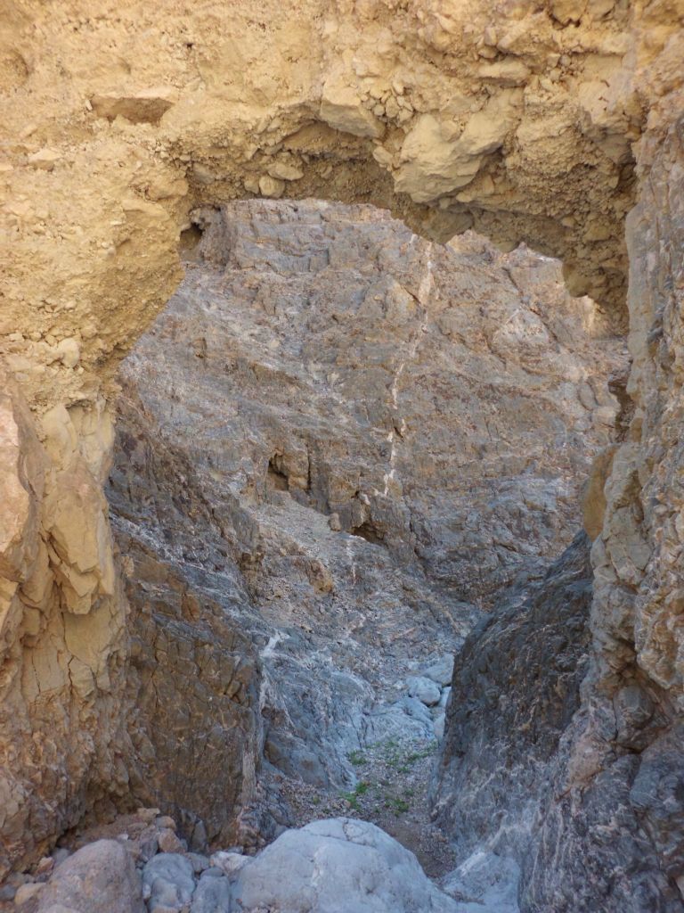 Notice how the water flows directly down canyon under the bridge.  Centuries or millenniums ago, this must have been a solid wall until rockslides re-routed the water flow in the canyon: