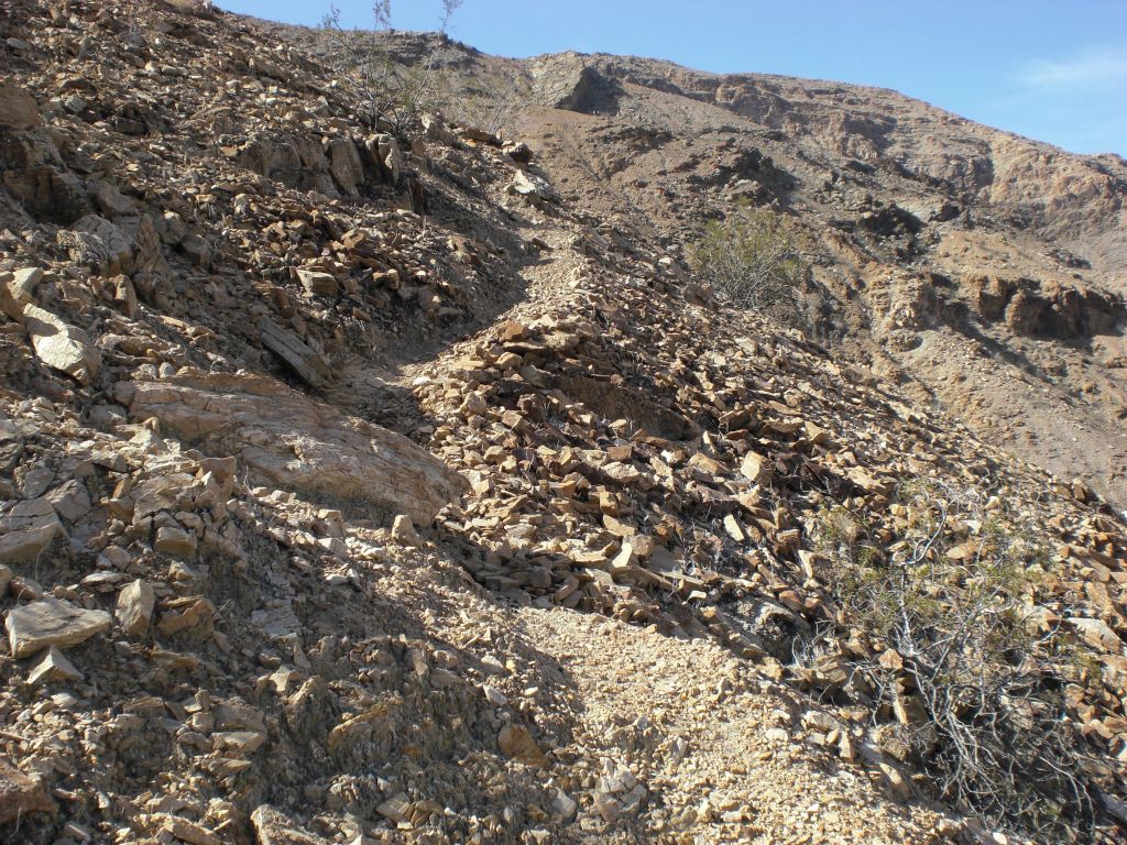 The faint sheep trail was somewhat easy to follow most of the time, but it was steep: